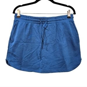 Halara Mid Rise Elastic Waistband Drawstring Side Pocket Curved Hem Mini Skirt